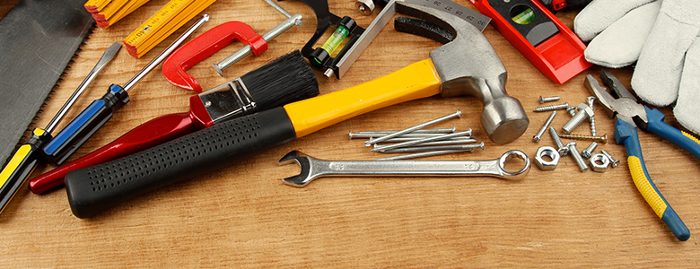Various tools laying on a table.