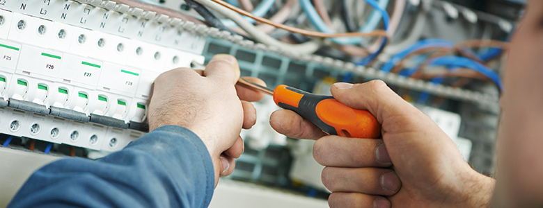Electrician working on wiring.